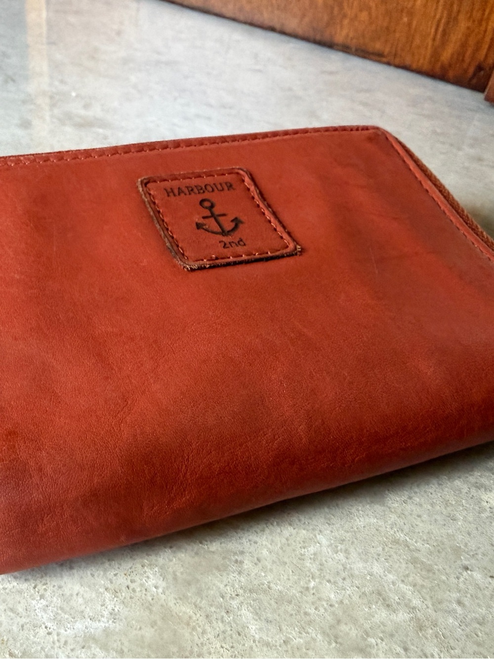 harbour 2nd trifold wallet. orange. rust. leather.